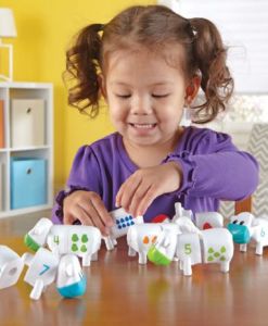 Snap-n-Learn™ Counting Cows sold by Gifts for Little Hands